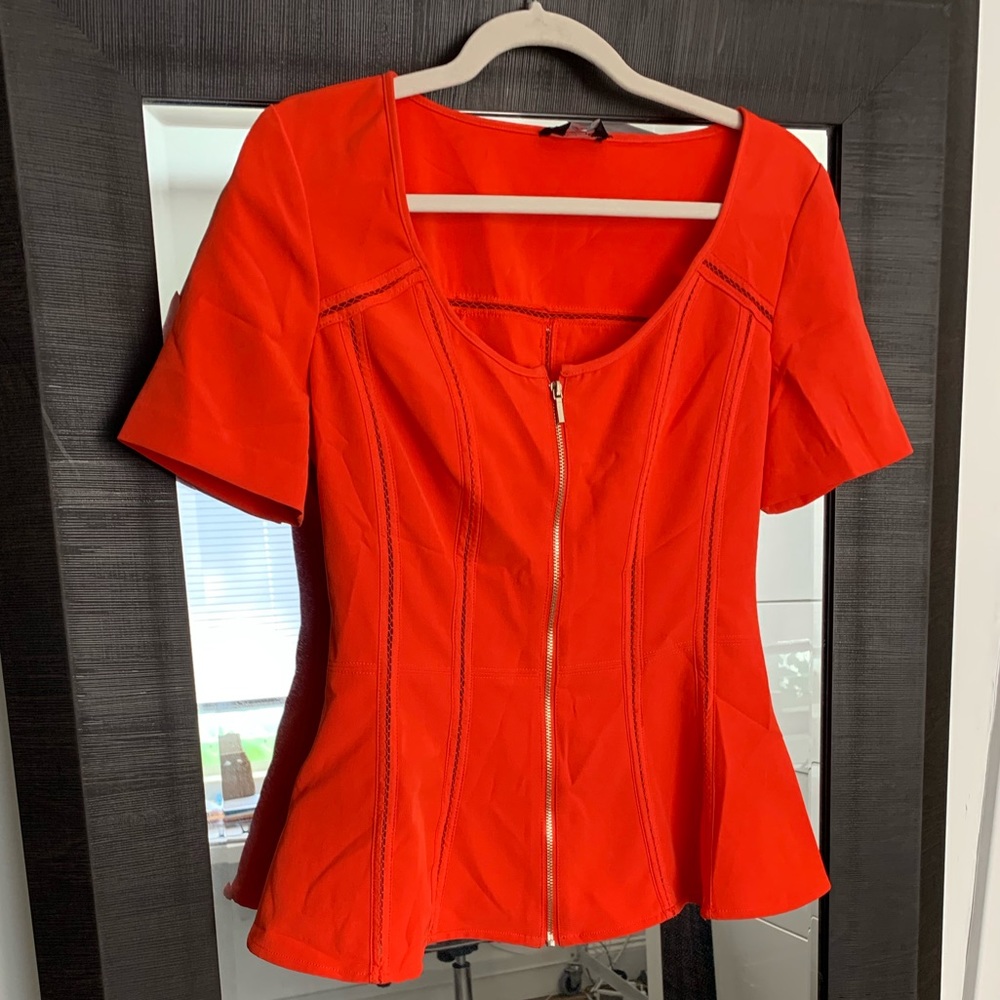 New Orange short sleeves blouse with zipper will enhance your figure.